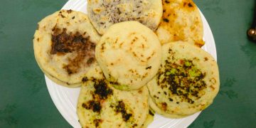 El Salvador Pupusa image. A plate with different types of pupusa.