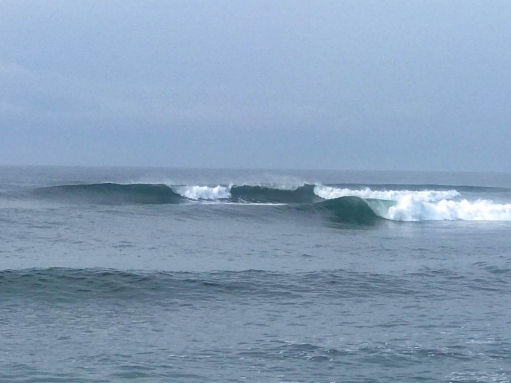 Surf Spot El Sunzal. Waves breaking early morning with light offshore winds.