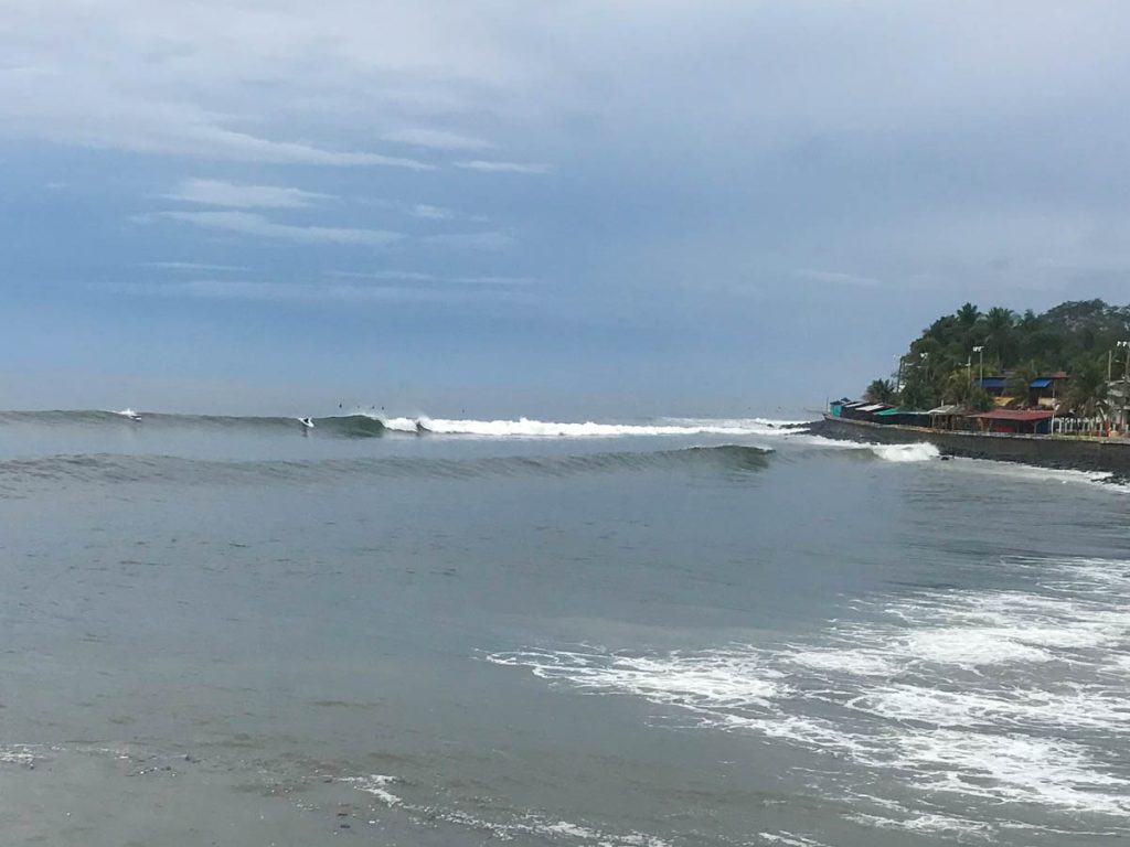 Surfing El Salvador surf spot La Paz at high tide.