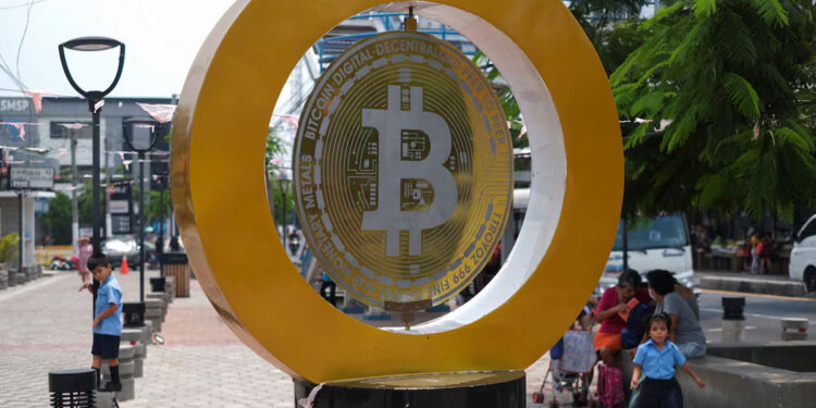 BItcoin symbol in san salvador illustrates a consideration in answering the question is El Salvador cheap to visit or not