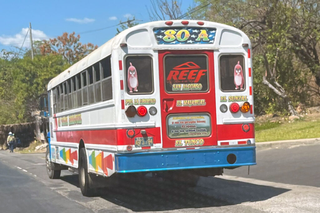 Image shows a ordinario bus the most popular way of getting around El salvador 
